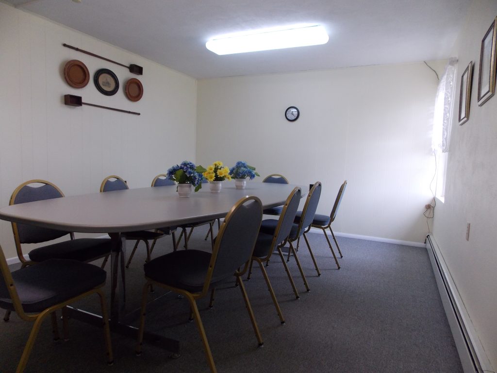 Long table with chairs in library